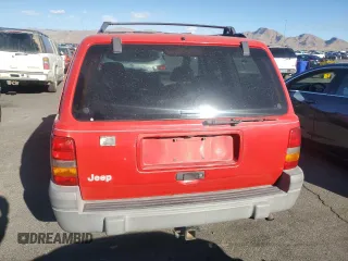 1997 Jeep Grand Cherokee Laredo with VIN 1J4GZ58S1VC760400, listed as a Copart auction lot 43932815 with 108,112 mi miles and Salvage Title. Bid and sale history available at carsss.com. Image 6.