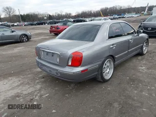 2005 Hyundai XG with VIN KMHFU45E55A424894, listed as a IAAI auction lot 41314611 with 158,408 mi miles. Bid and sale history available at carsss.com. Image 4.