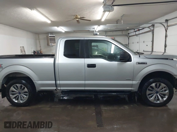 2017 Ford F-150 XL with VIN 1FTEX1EP7HFB64173, listed as a IAAI auction lot 41471112 with 65,277 mi miles and . Bid and sale history available at DreamBid. Image 14.