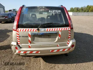 2006 Nissan X-Trail XE z VIN JN8BT08T06W100432, wystawiony jako Copart lot #70907374 z przebiegiem 263 759 mil mil oraz Szkody całkowita. Historia ofert i sprzedaży dostępna na DreamBid. Obrazek 6.