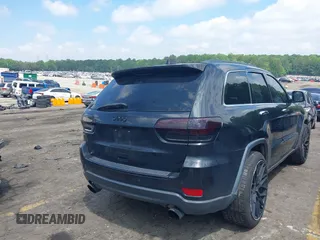 2014 Jeep Grand Cherokee Limited with VIN 1C4RJFBG3EC545861, listed as a IAAI auction lot 42216743 with 160,000 mi miles and . Bid and sale history available at DreamBid. Image 4.
