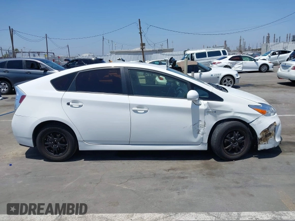 2013 Toyota Prius One z VIN JTDKN3DUXD5657826, wystawiony jako IAAI lot #42346122 z przebiegiem 129 882 mil mil oraz . Historia ofert i sprzedaży dostępna na DreamBid. Obrazek 14.