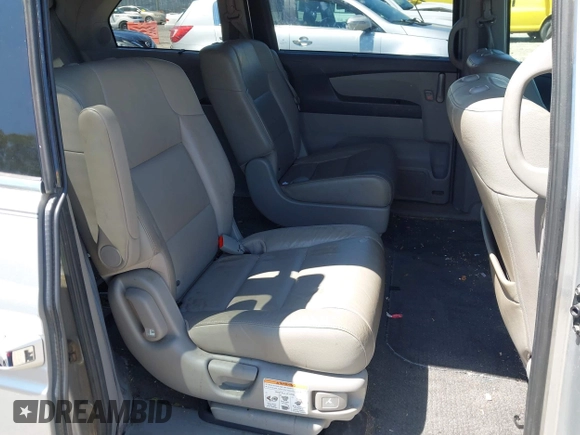 2012 Honda Odyssey Touring with VIN 5FNRL5H96CB043939, listed as a IAAI auction lot 41983643 with 202,535 mi miles. Bid and sale history available at carsss.com. Image 8.