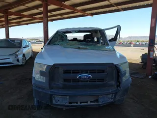2015 Ford F-150 XLT with VIN 1FTEW1C81FKE76735, listed as a IAAI auction lot 41826968 with 160,530 mi miles and . Bid and sale history available at carsss.com. Image 6.