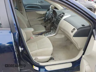 2012 Toyota Corolla L with VIN 5YFBU4EE7CP061770, listed as a IAAI auction lot 41922205 with 154,615 mi miles. Bid and sale history available at carsss.com. Image 5.