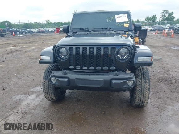 2023 Jeep Gladiator Overland with VIN 1C6JJTFM9PL593659, listed as a IAAI auction lot 42470253 with 34,374 mi miles and . Bid and sale history available at DreamBid. Image 19.