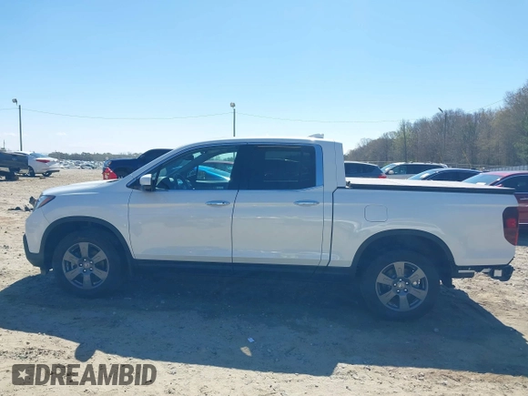 2020 Honda Ridgeline RTL-E with VIN 5FPYK3F75LB000317, listed as a IAAI auction lot 41850029 with 17,430 mi miles and . Bid and sale history available at DreamBid. Image 15.