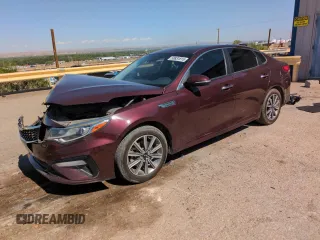 2019 Kia Optima LX z VIN 5XXGT4L33KG355118, wystawiony jako Copart lot #58831815 z przebiegiem 70 984 mil mil oraz Szkoda całkowita • Salvage title. Historia ofert i sprzedaży dostępna na DreamBid. Obrazek 1.