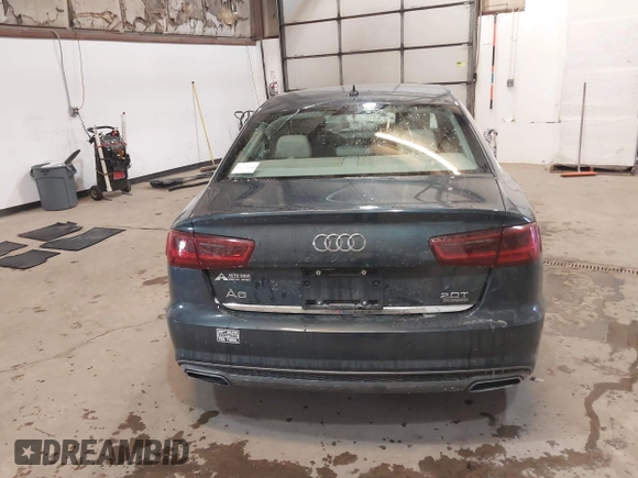 2016 Audi A6 2.0T Premium Plus with VIN WAUGFAFC8GN088505, listed as a IAAI auction lot 41569043 with 98,528 mi miles. Bid and sale history available at carsss.com. Image 17.
