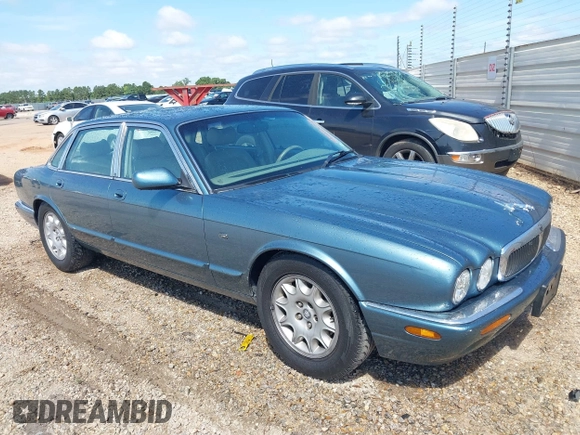 1998 Jaguar XJ with VIN SAJHX1241WC819418, listed as a IAAI auction lot 42456539 with 126,457 mi miles and . Bid and sale history available at DreamBid. Image 1.
