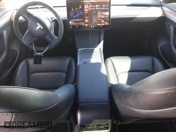 2023 Tesla Model 3 with VIN 5YJ3E1EA5PF652212, listed as a Copart auction lot 57348395 with 8,780 mi miles and Salvage title. Bid and sale history available at DreamBid. Image 8.