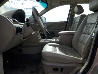 2007 Ford Five Hundred Limited с VIN 1FAHP25177G126360, выставлен на аукционе Copart как лот 55829575 с пробегом 135 883 миль миль и Списание • Salvage title. История ставок и продаж доступна на DreamBid. Изображение 7.