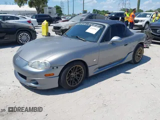 2003 Mazda MX-5 Miata Cloth with VIN JM1NB353930311340, listed as a IAAI auction lot 42145967 with 194,740 mi miles and . Bid and sale history available at DreamBid. Image 18.