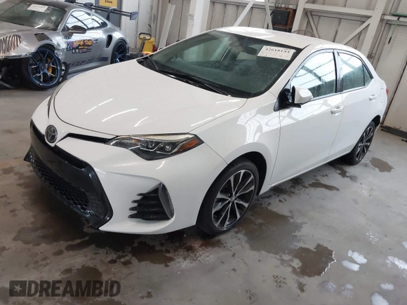2017 Toyota Corolla L z VIN 2T1BURHE9HC784195, wystawiony jako IAAI lot #42618144 z przebiegiem 85 568 mil mil oraz . Historia ofert i sprzedaży dostępna na DreamBid. Obrazek 2.