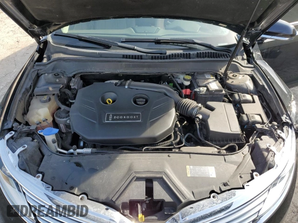 2016 Lincoln MKZ z VIN 3LN6L2J95GR629768, wystawiony jako Copart lot #49098085 z przebiegiem 116 365 mil mil oraz Szkoda całkowita • Salvage title. Historia ofert i sprzedaży dostępna na DreamBid. Obrazek 11.