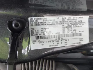 2018 Ford Focus SE with VIN 1FADP3F22JL295342, listed as a IAAI auction lot 42335881 with 77,464 mi miles and . Bid and sale history available at DreamBid. Image 9.