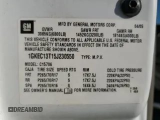 2005 GMC Yukon SLE with VIN 1GKEC13T15J230550, listed as a Copart auction lot 77214624 with 203,095 mi miles and Salvage Title. Bid and sale history available at carsss.com. Image 13.