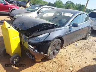 2019 Tesla Model 3 Long Range with VIN 5YJ3E1EB2KF510398, listed as a IAAI auction lot 42067654 with 108,971 mi miles and . Bid and sale history available at DreamBid. Image 2.