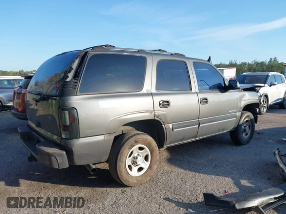 2001 Chevrolet Tahoe LS with VIN 1GNEC13T11R182692, listed as a IAAI auction lot 41511354 with 293,614 mi miles and . Bid and sale history available at DreamBid. Image 4.