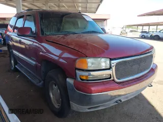 2002 GMC Yukon SLT z VIN 1GKEK13Z32R279446, wystawiony jako IAAI lot #42381241 z przebiegiem 242 680 mil mil oraz . Historia ofert i sprzedaży dostępna na DreamBid. Obrazek 1.