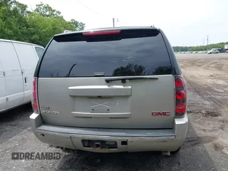 2009 GMC Yukon Denali z VIN 1GKFK03259R271652, wystawiony jako IAAI lot #42463982 z przebiegiem Nie podano mil oraz . Historia ofert i sprzedaży dostępna na DreamBid. Obrazek 16.