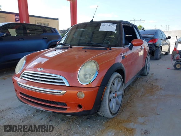 2005 MINI Convertible with VIN WMWRF334X5TF61026, listed as a IAAI auction lot 42125720 with 117,908 mi miles and . Bid and sale history available at DreamBid. Image 2.