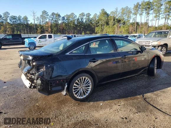 2019 Toyota Avalon Limited Hybrid z VIN 4T1B21FB3KU008344, wystawiony jako Copart lot #84662964 z przebiegiem 127 254 mil mil oraz Szkoda całkowita • Salvage title. Historia ofert i sprzedaży dostępna na DreamBid. Obrazek 3.