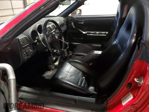2002 Toyota MR2 z VIN JTDFR320320041854, wystawiony jako Copart lot #82822754 z przebiegiem 129 450 mil mil oraz Szkoda całkowita • Salvage title. Historia ofert i sprzedaży dostępna na DreamBid. Obrazek 7.