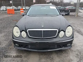 2003 Mercedes-Benz E-Class 5.5L AMG with VIN WDBUF76JX3A267197, listed as a IAAI auction lot 41485778 with 89,310 mi miles. Bid and sale history available at carsss.com. Image 12.