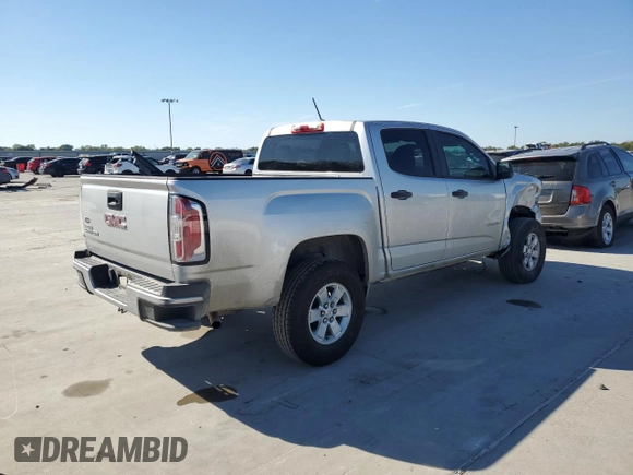 2020 GMC Canyon 2WD with VIN 1GTG5BEA2L1237021, listed as a Copart auction lot 76358214 with 77,815 mi miles and Salvage Title. Bid and sale history available at carsss.com. Image 3.