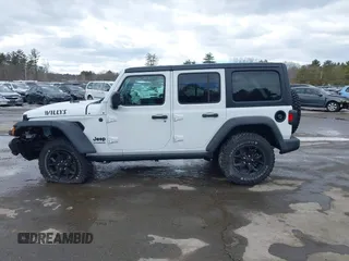 2022 Jeep Wrangler Unlimited Sport S with VIN 1C4HJXDG3NW155467, listed as a IAAI auction lot 41638650 with 22,698 mi miles and . Bid and sale history available at DreamBid. Image 14.