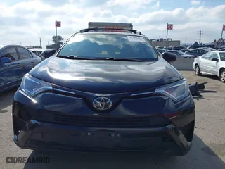 2018 Toyota RAV4 LE with VIN 2T3ZFREVXJW457751, listed as a IAAI auction lot 41529251 with 230,054 mi miles. Bid and sale history available at carsss.com. Image 13.