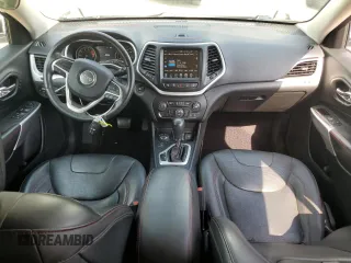 2018 Jeep Cherokee Trailhawk with VIN 1C4PJMBX0JD610455, listed as a Copart auction lot 61251565 with 75,818 mi miles and Salvage title. Bid and sale history available at DreamBid. Image 8.