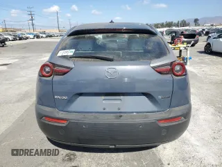2022 Mazda MX-30 Premium Plus Package with VIN JM1DRADB1N0100639, listed as a Copart auction lot 71770904 with 23,452 mi miles and Salvage Title. Bid and sale history available at carsss.com. Image 6.