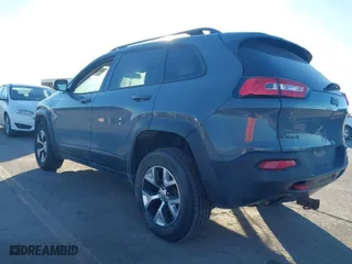 2015 Jeep Cherokee Trailhawk with VIN 1C4PJMBB5FW540094, listed as a IAAI auction lot 41440568 with 191,852 mi miles. Bid and sale history available at carsss.com. Image 3.