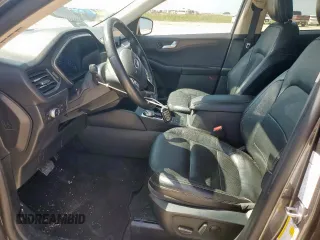 2020 Ford Escape Titanium Hybrid z VIN 1FMCU0DZ1LUC38345, wystawiony jako Copart lot #59628985 z przebiegiem 86 917 mil mil oraz Szkoda całkowita • Salvage title. Historia ofert i sprzedaży dostępna na DreamBid. Obrazek 7.