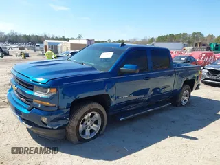 2018 Chevrolet Silverado 1500 LT with VIN 3GCUKREC9JG211391, listed as a IAAI auction lot 41710886 with 113,989 mi miles. Bid and sale history available at carsss.com. Image 2.