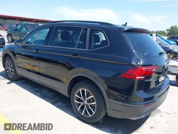 2021 Volkswagen Tiguan S with VIN 3VV1B7AX9MM067347, listed as a IAAI auction lot 42305101 with 77,042 mi miles and . Bid and sale history available at DreamBid. Image 3.