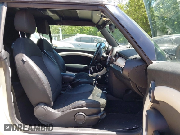 2012 MINI Convertible with VIN WMWZN3C51CT134646, listed as a IAAI auction lot 42252740 with 124,278 mi miles and . Bid and sale history available at DreamBid. Image 5.