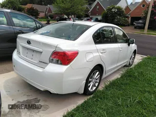 2014 Subaru Impreza Premium with VIN JF1GJAC68EH007312, listed as a IAAI auction lot 42717142 with 111,951 mi miles and . Bid and sale history available at DreamBid. Image 4.