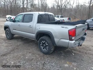 2019 Toyota Tacoma 4WD SR with VIN 5TFCZ5AN8KX168893, listed as a IAAI auction lot 41823745 with 146,557 mi miles. Bid and sale history available at carsss.com. Image 3.