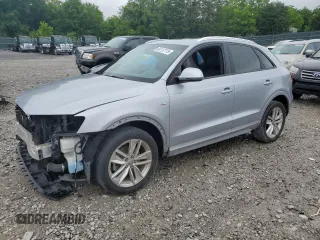 2018 Audi Q3 Premium with VIN WA1BCCFSXJR003408, listed as a Copart auction lot 60112115 with 128,146 mi miles and Salvage title. Bid and sale history available at DreamBid. Image 1.