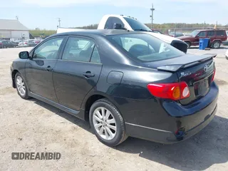 2009 Toyota Corolla with VIN 1NXBU40E29Z085117, listed as a IAAI auction lot 42059893 with 199,576 mi miles. Bid and sale history available at carsss.com. Image 3.