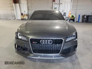 2015 Audi RS 7 z VIN WUAW2CFC5FN900592, wystawiony jako Copart lot #49462463 z przebiegiem 74 694 mil mil oraz . Historia ofert i sprzedaży dostępna na DreamBid. Obrazek 5.