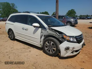 2016 Honda Odyssey Touring Elite with VIN 5FNRL5H94GB109829, listed as a Copart auction lot 52583225 with 70,740 mi miles and Salvage Title. Bid and sale history available at carsss.com. Image 4.