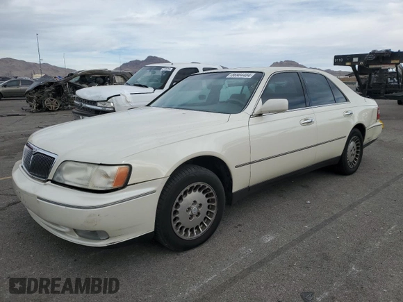1998 Infiniti Q45 z VIN JNKBY31A8WM403038, wystawiony jako Copart lot #86904484 z przebiegiem 136 142 mil mil oraz Szkoda całkowita • Salvage title. Historia ofert i sprzedaży dostępna na DreamBid. Obrazek 1.
