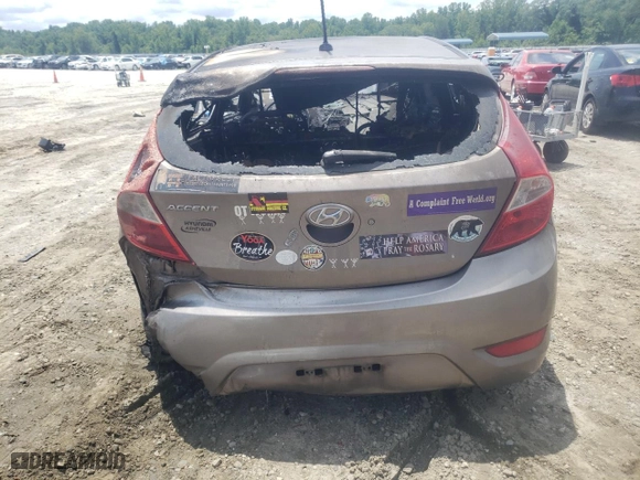 2014 Hyundai Accent SE with VIN KMHCU5AEXEU159810, listed as a Copart auction lot 61634604 with 0 mi miles and Salvage Title. Bid and sale history available at carsss.com. Image 6.