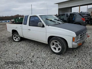 1990 Nissan Frontier with VIN 1N6SD16S9LC404281, listed as a Copart auction lot 84214904 with 279,270 mi miles and Salvage title. Bid and sale history available at DreamBid. Image 4.