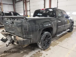 2011 GMC Sierra 1500 Denali z VIN 3GTP2XE2XBG128854, wystawiony jako IAAI lot #41606670 z przebiegiem 150 556 mil mil oraz . Historia ofert i sprzedaży dostępna na DreamBid. Obrazek 4.