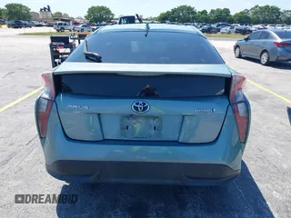 2016 Toyota Prius Four z VIN JTDKARFU0G3016597, wystawiony jako IAAI lot #42034214 z przebiegiem 125 799 mil mil oraz . Historia ofert i sprzedaży dostępna na DreamBid. Obrazek 16.